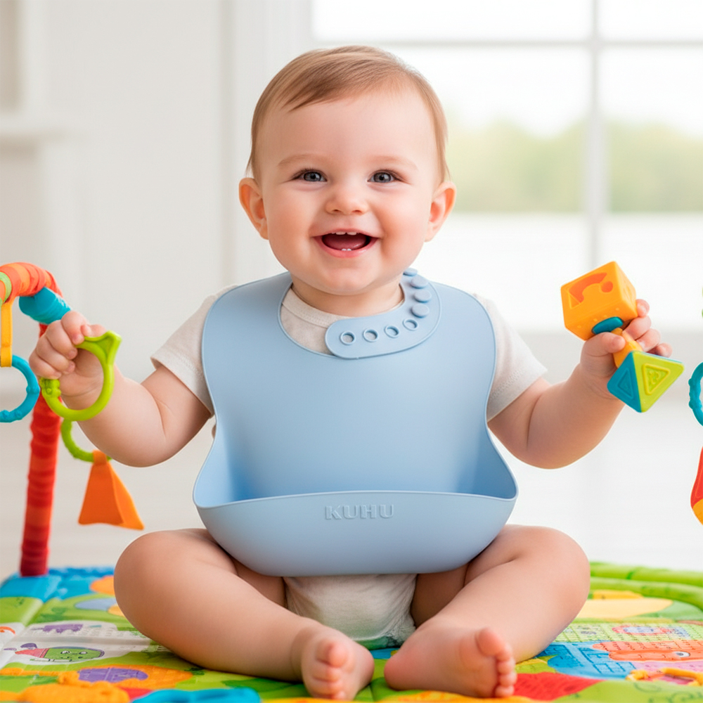 Babador De Silicone Kuhu Azul Pega Migalhas Ajustável